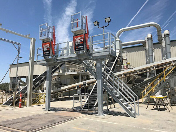 access platform clearing debris from pistachio load