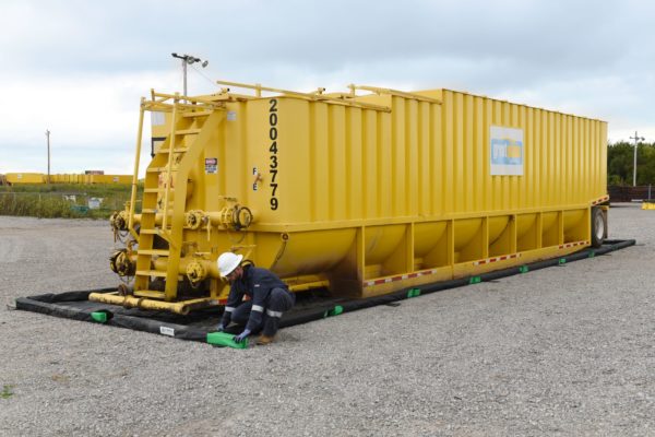 Spill containment for large capacity steel tanks