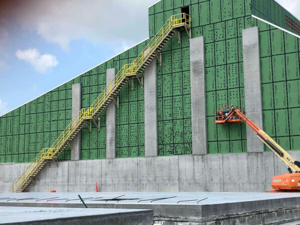 metal stair installation at a hopper car loading facility