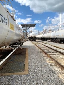 Railcar with safety cage