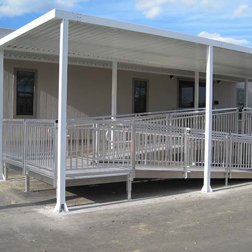 Ramp and canopy for permanent modular facility