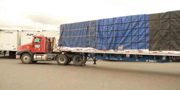 roxul has saferack install a safe flatbed tarping system