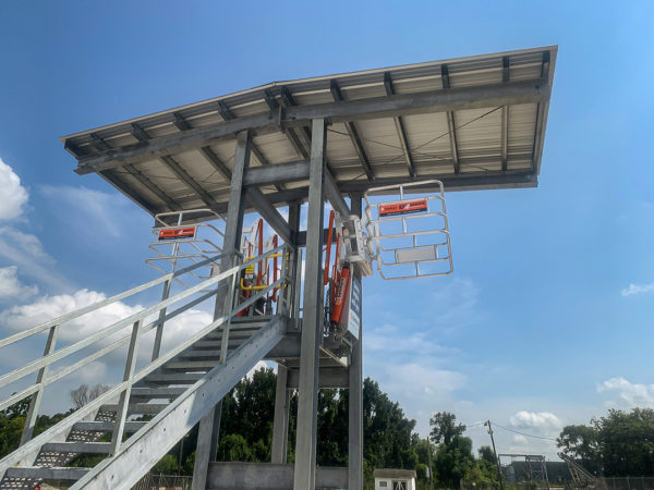 SafeRack Canopy Covered Double-sided Truck Loading Platform with SAS Gangways and YellowGate Fall Protection for Buckeye Partners Corporate in PA