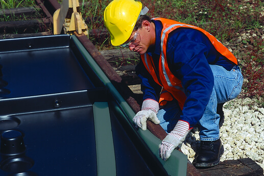 track pan gaskets installed between pan and rail web